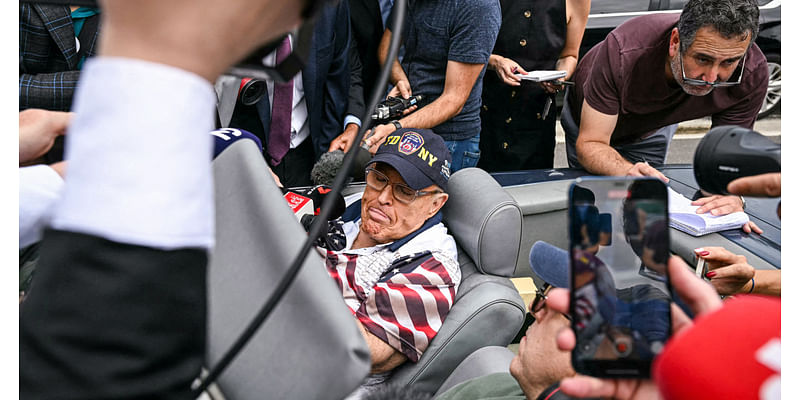 Rudy Giuliani shows up to vote in the car he was ordered to surrender