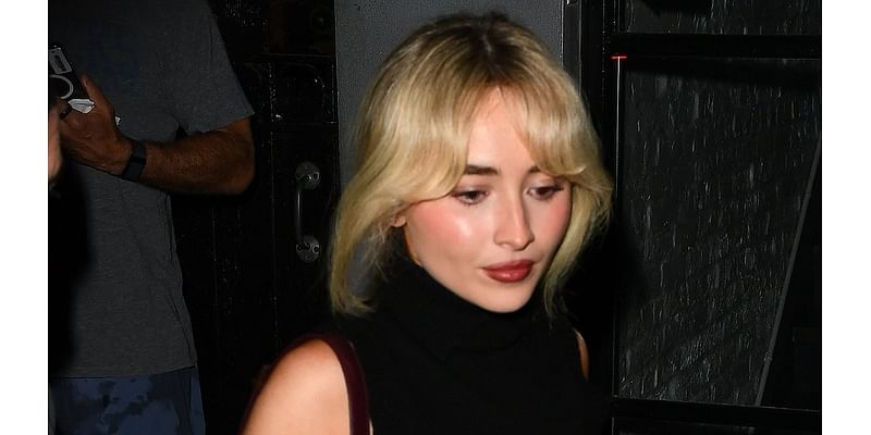 Sabrina Carpenter nails autumnal style in a plaid skirt and black sweater vest as she steps out in NYC amid the US leg of her sold out Short n' Sweet tour