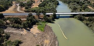 Bulldozers rip up Tuolumne River banks east of Modesto. The goal is better fish habitat