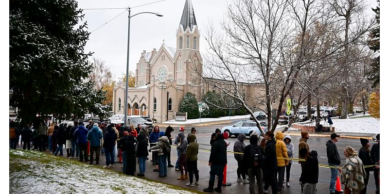 Free pizza and a DJ help defrost Montana voters lined up until 4 a.m. in the snow to vote