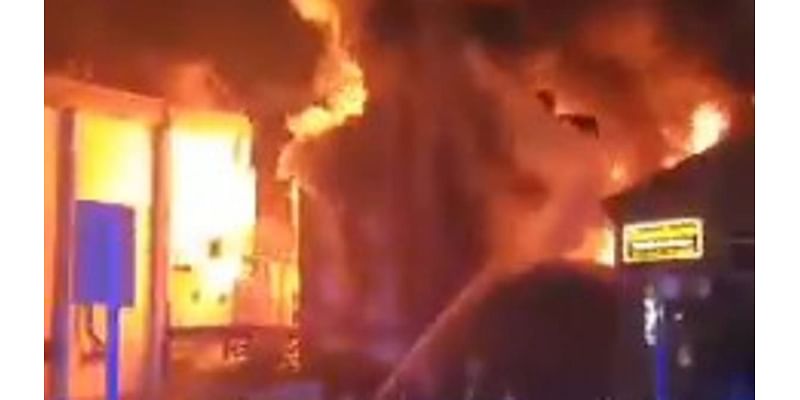 Shocking moment massive fireball erupts into the sky after derelict building goes up in flames in Preston city centre