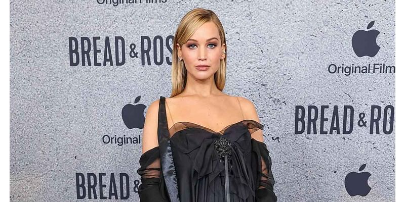 Pregnant Jennifer Lawrence Cradles Baby Bump at Bread & Roses Premiere