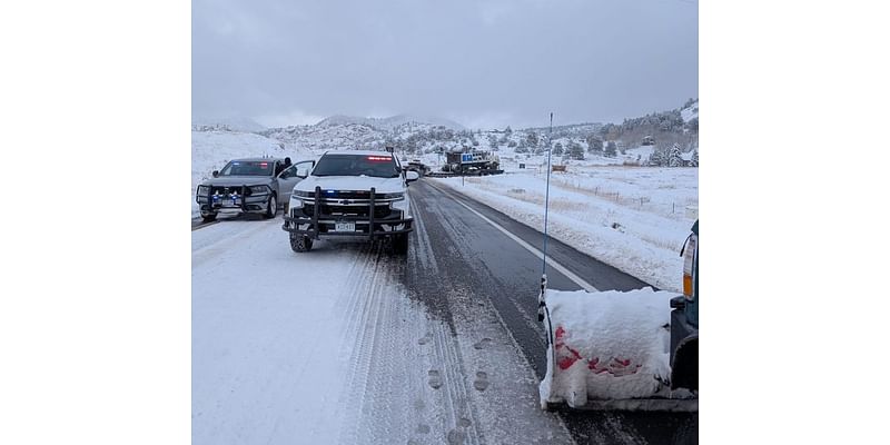 Locals jump into action to free semi stuck on Highway 96