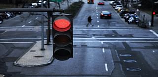 What are the rules when the lights at an intersection are all flashing red?