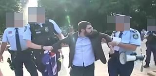 Wild scenes as Jewish man displaying Australian flag is arrested for 'breaching the peace' at a pro-Palestine protest