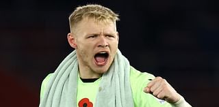 Aaron Ramsdale is spotted laughing and joking with Reece James at Twickenham after pulling out of England duty - as he shows off bandage having suffered finger injury