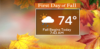 Breezy, wet for first day of fall in Chicago