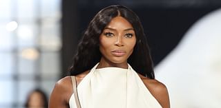 Naomi Campbell looks chic in a cream halterneck as she storms the runway with Irina Shayk at Tod's Milan Fashion Week show