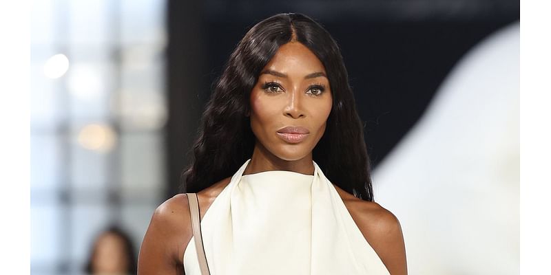 Naomi Campbell looks chic in a cream halterneck as she storms the runway with Irina Shayk at Tod's Milan Fashion Week show