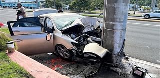 Driver unresponsive after collision with concrete pole