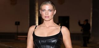 Lady Amelia Spencer leads the glamour in a leather corset dress as she joins twin Lady Eliza at Milan Fashion Week's Versace show