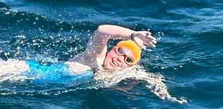 Teen swims English Channel powered by sweets and peaches