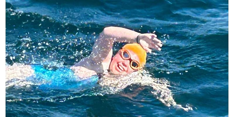 Teen swims English Channel powered by sweets and peaches