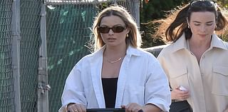 Margot Robbie glows as she takes her newborn son for a stroll in Los Angeles