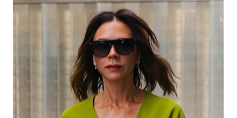 Victoria Beckham commands attention in colour-clashing outfit as she arrives at One World Trade Center to attend Vogue's Forces of Fashion event in New York City