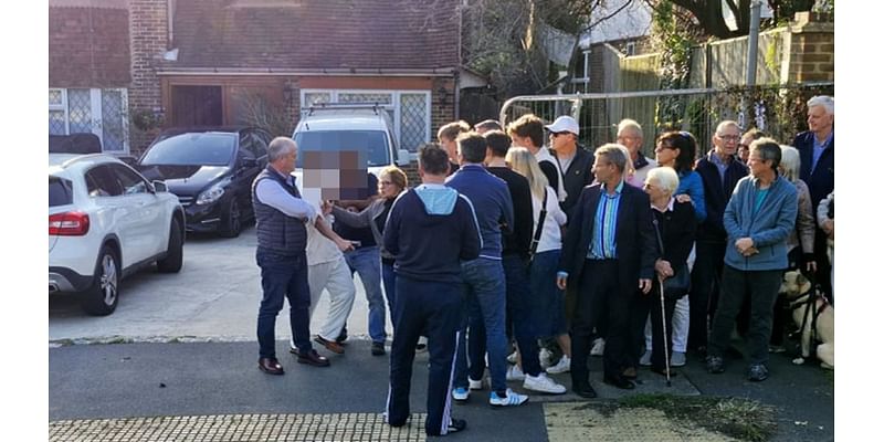 'It's like living in a warzone!' Fury on leafy Sussex street after man blocks off public footpath and REFUSES to let neighbours go near it