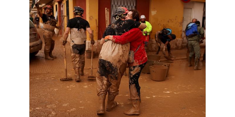 Spain floods: Families fear bodies of loved ones are waiting to be discovered in the mud