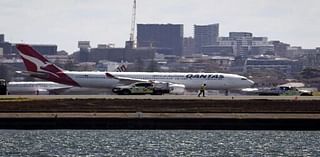 Qantas plane returns to Australia airport due to 'engine failure', sparks fire