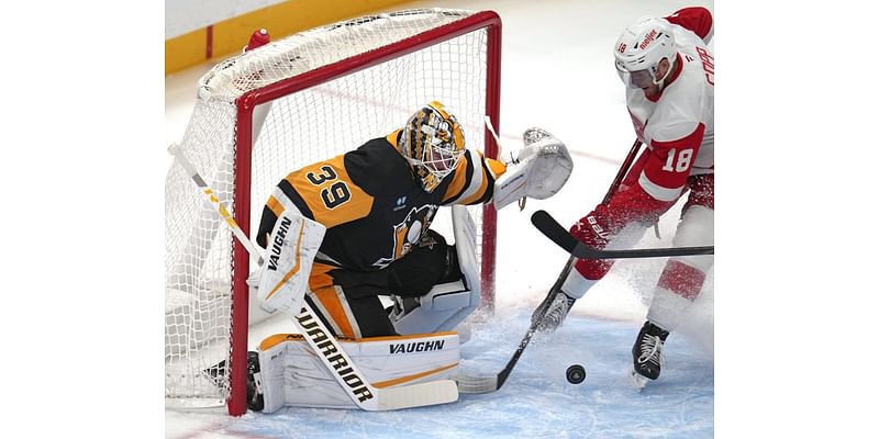 Red Wings score in OT to beat Penguins