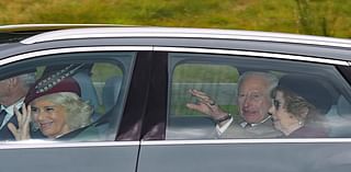 Beaming King Charles and Queen Camilla wave to well-wishers en route to Sunday service at Crathie Kirk near Balmoral