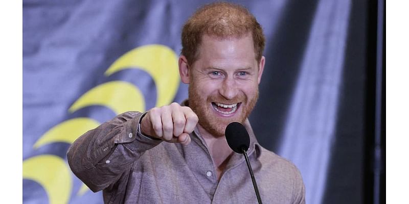 Sweet moment school kids' faces light up as Prince Harry hands out free tickets to the Invictus Games Opening Ceremony in Canada