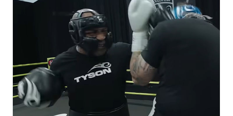 'Can you imagine Jake Paul's face,' says Mike Tyson trainer as he BREAKS boxing pad with brutal power in training video