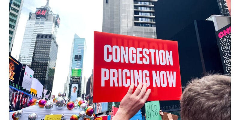 Protesters march in Manhattan on what would have been congestion pricing eve