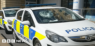 Arrest after police cars smashed outside Bath station