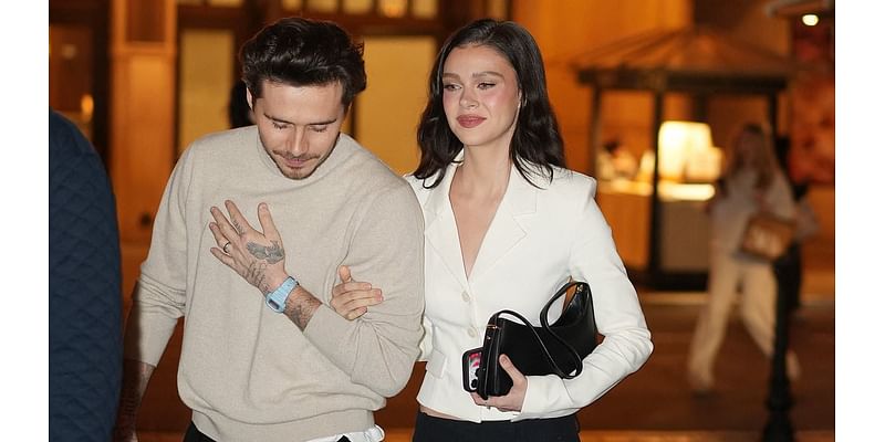 Brooklyn Beckham and wife Nicola Peltz put on a loved-up display as they lead the stars attending REVOLVE's Holiday Shop bash in LA