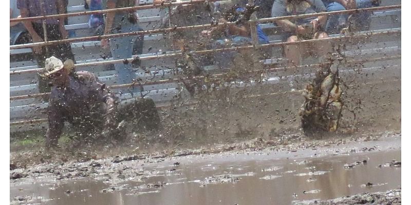 Mud wrestling at the Sumner rodeo