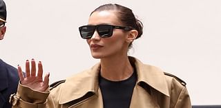 Bella Hadid cuts a stylish figure in a brown trench coat as she heads to a Valentino fitting ahead of Paris Fashion Week