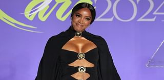 Kelly Rowland flaunts cleavage in caped cut-out gown at HollyRod Foundation benefit in LA - after reuniting with Beyoncé for whisky ad