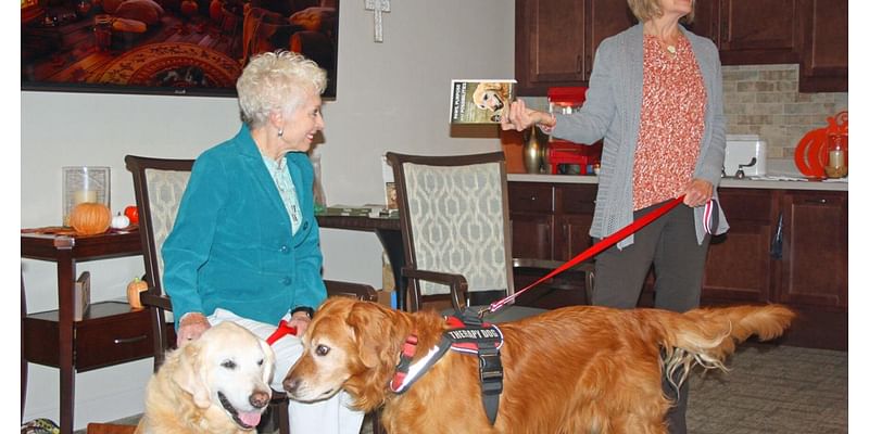 Therapy dogs provide companionship for Riverwood residents