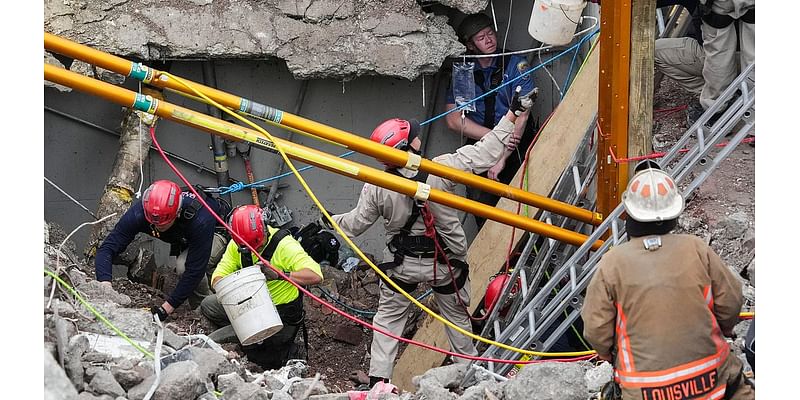 Dramatic moment construction worker who was buried alive for NINE HOURS is dug out by rescue teams