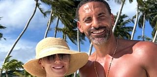 Kate Ferdinand showcases her toned curves in a black bikini and straw hat as she poses for a loved-up snap on the beach with husband Rio