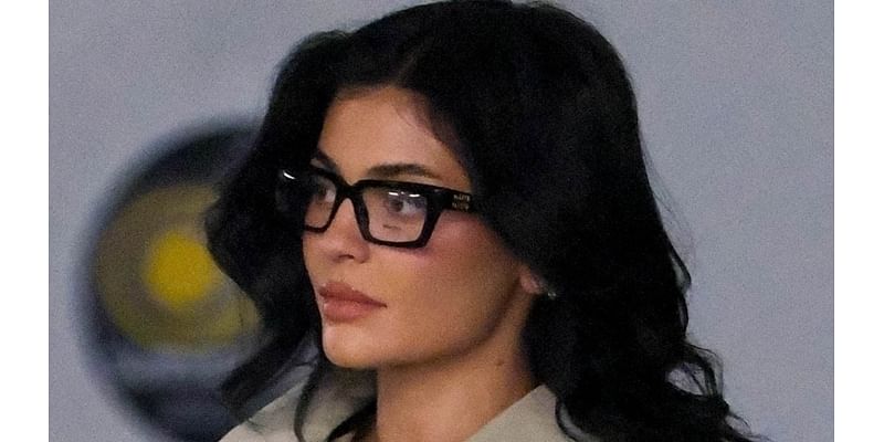 Kylie Jenner looks stylish in Miu Miu trench coat and boots while out in LA