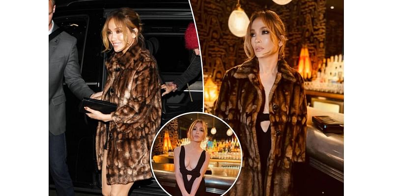 Jennifer Lopez pairs plunging bow–tied LBD with faux fur coat in London