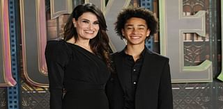 Idina Menzel poses with teenage son Walker at 'Wicked' premiere