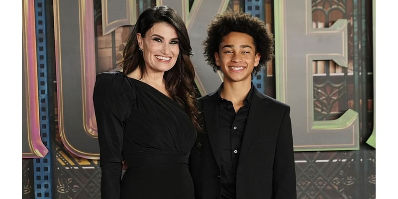 Idina Menzel poses with teenage son Walker at 'Wicked' premiere