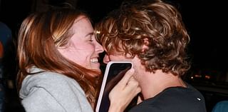 Euphoria's Lukas Gage playfully packs on a PDA with two female friends during a wild night out in West Hollywood