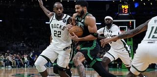 Tatum shakes off illness, helps Celtics slow Giannis and beat fellow East power Bucks 119-116