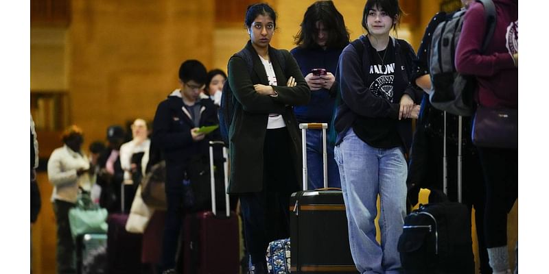 Thanksgiving travel rush begins with snowy weather threatening the Northeast