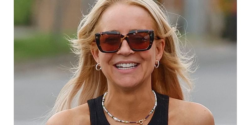 Carrie Bickmore turns up the heat in very revealing activewear as she steps out in Melbourne with her teenage son Ollie