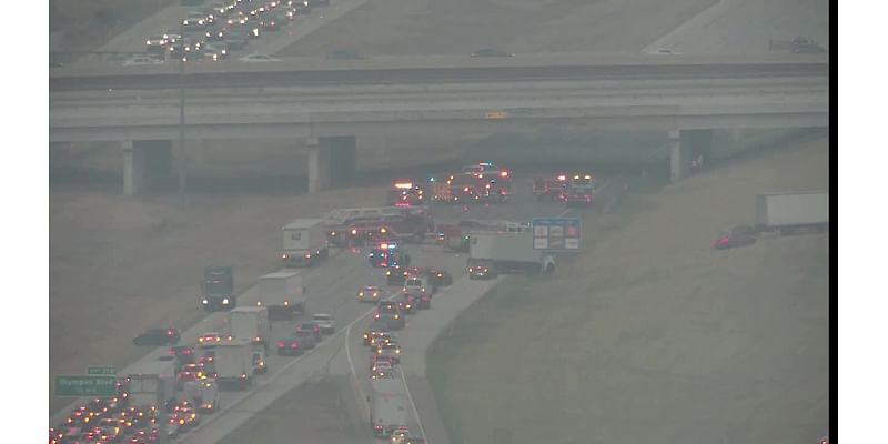 Traffic Alert: Truck carrying cement block strikes I-635 overpass in Irving