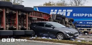 M6 crash: Overturned lorry hits central reservation closing major route