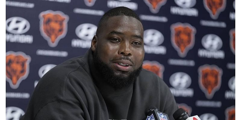 Nate Davis showed up Sunday with a back injury. On Wednesday, the Chicago Bears cut him