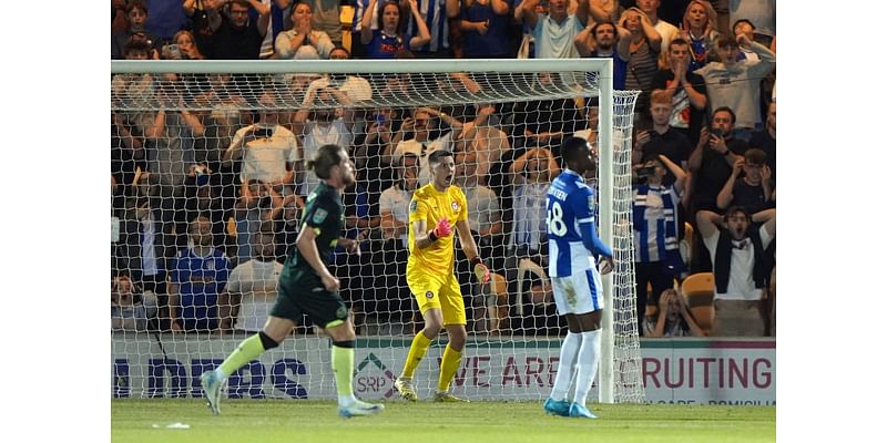 Hakon Valdimarsson saves late penalty as Brentford battle past Colchester