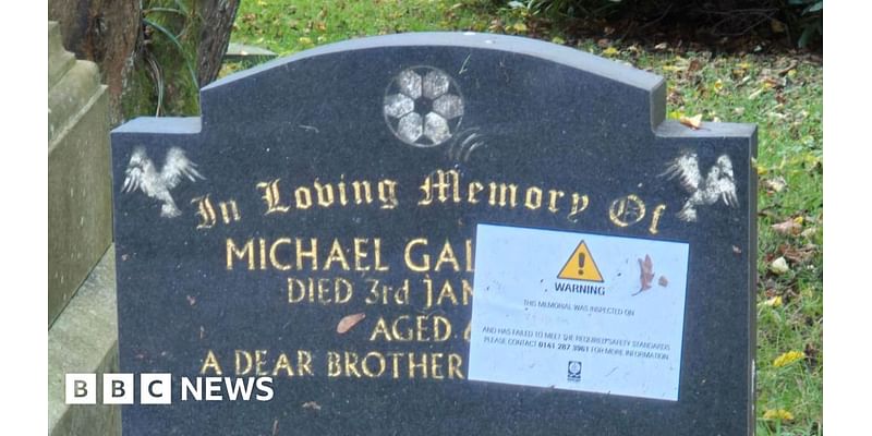 Council defends decision to put stickers on graves