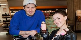 Brooklyn Beckham pushes wife Nicola Peltz in shopping trolley as he promotes new hot sauce