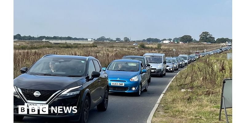 long queues for free hazardous waste scheme in Norfolk